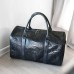 Дорожня каркасна сумка зі шкіри пітона Gust (black)